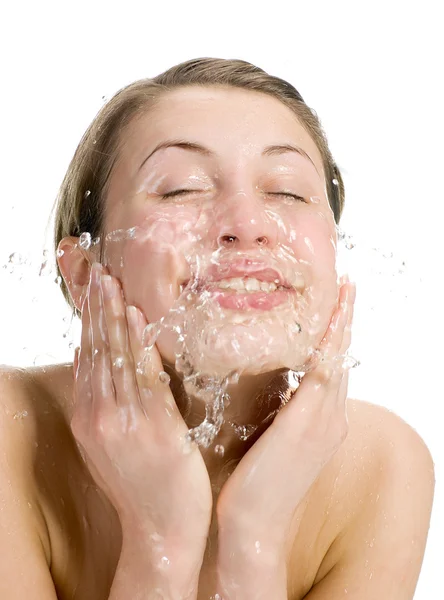 Pretty woman refreshing the face — Stock Photo, Image