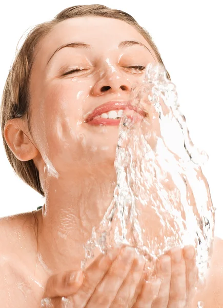 Pretty woman refreshing the face — Stock Photo, Image