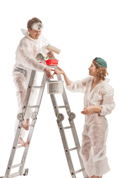 Attractive young adult couple painting — Stock Photo, Image