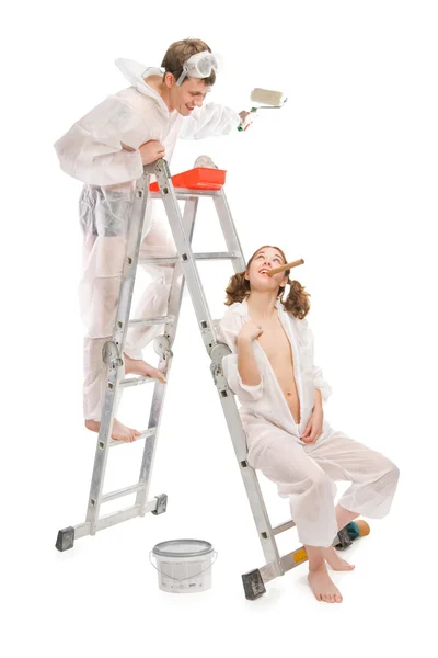 Attractive young adult couple painting — Stock Photo, Image