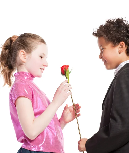 stock image Boy giving a rose to a girl