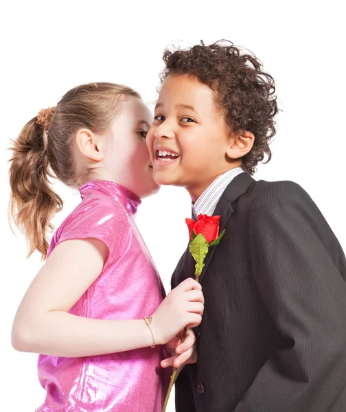 stock image Cute little girl kissing a boy