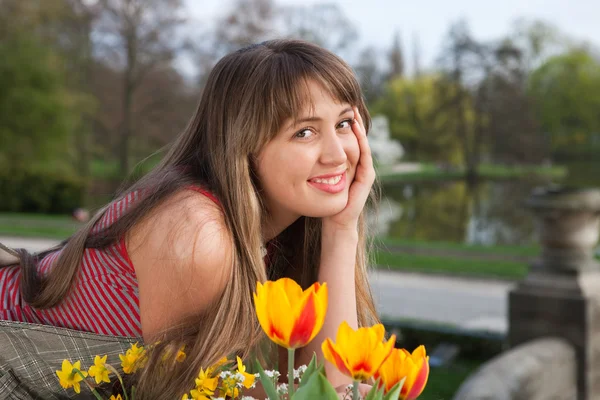 Beautiful spring portrait with tulips — Stock Photo, Image
