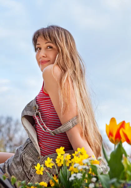 Beautiful spring portrait with tulips — Stock Photo, Image