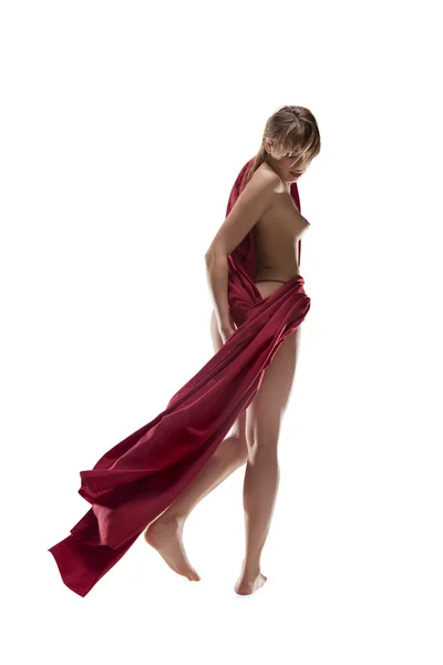 Naked young blonde woman, wrapped in red — Stock Photo, Image