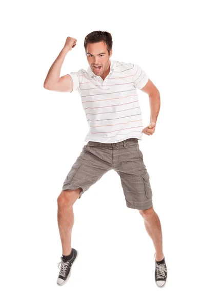 Joven hombre feliz saltando sobre un blanco — Foto de Stock