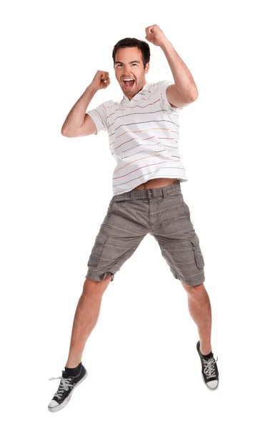 Jovem homem feliz pulando em um branco — Fotografia de Stock