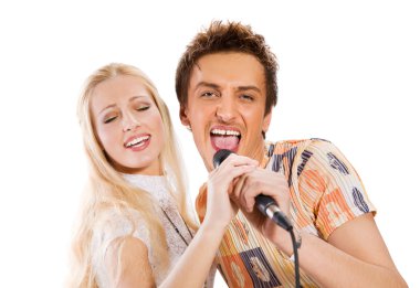 Attractive young couple singing clipart