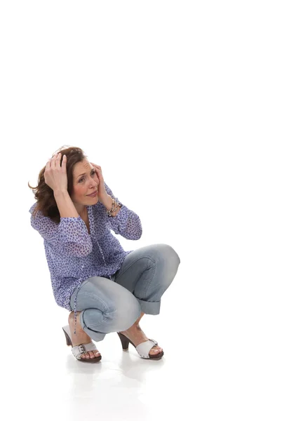 Scared woman holding her head — Stock Photo, Image