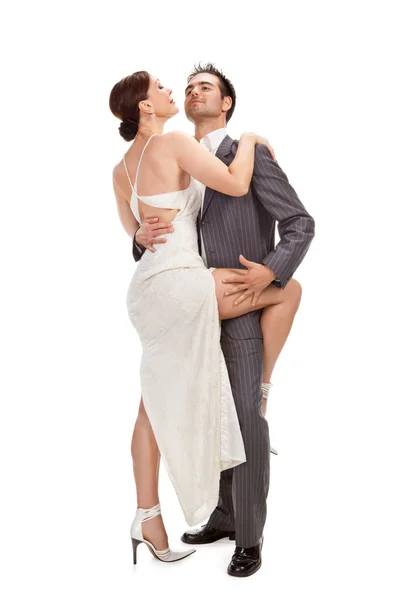Fashion couple dancing , studio shot — Stock Photo, Image