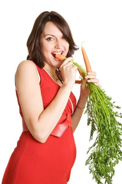 Gravid kvinna med färska morötter — Stockfoto