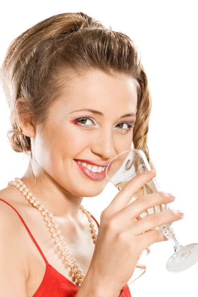 Attractive girl in Santa hat with champagne glass — Stock Photo, Image