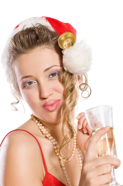 Menina atraente em chapéu de Santa com copo de champanhe — Fotografia de Stock