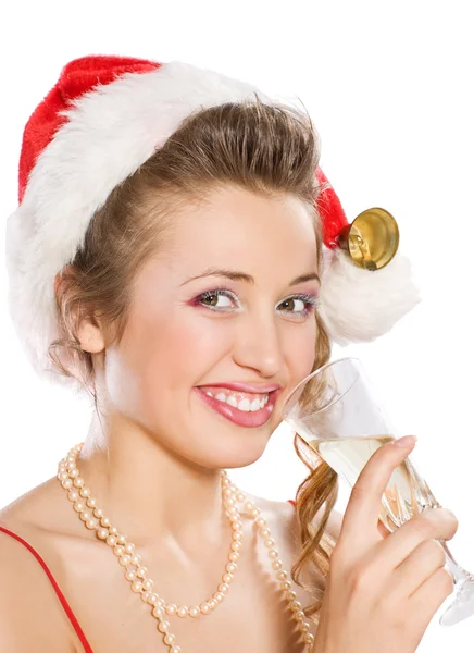 Attraktiva flicka i santa mössa med champagne glas — Stockfoto