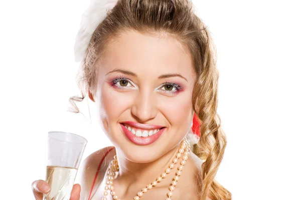 Vakker jente i nissehatt med champagneglass – stockfoto