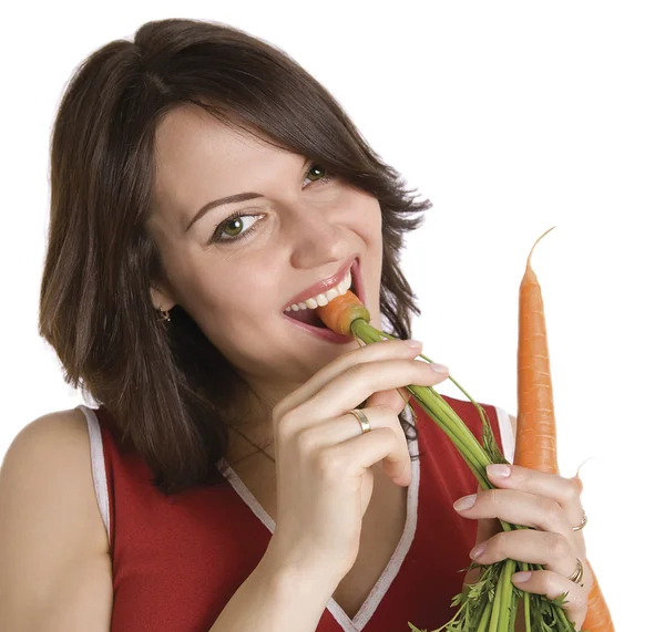 Mujer con zanahorias frescas — Foto de Stock