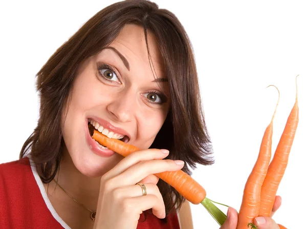 Frau mit frischen Karotten — Stockfoto