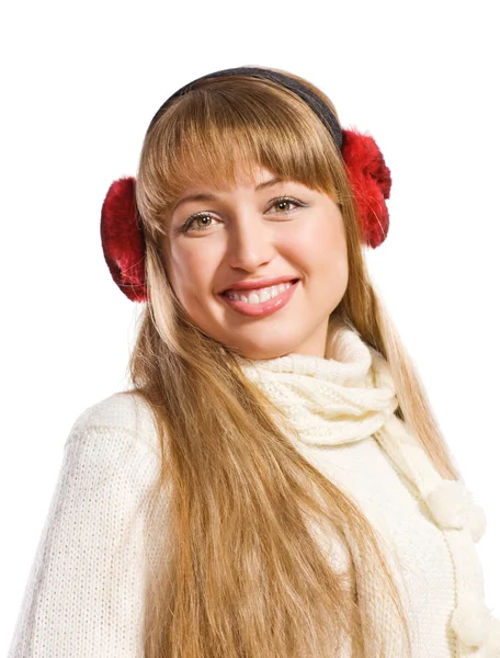 Mooie jonge vrouw dragen oorkleppen — Stockfoto