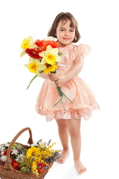 Cute little girl z kwiatami — Zdjęcie stockowe