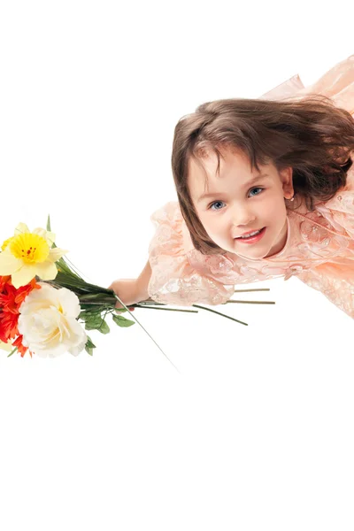 Cute little girl with flowers — Stock Photo, Image