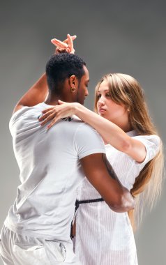 Young couple dances Caribbean Salsa clipart