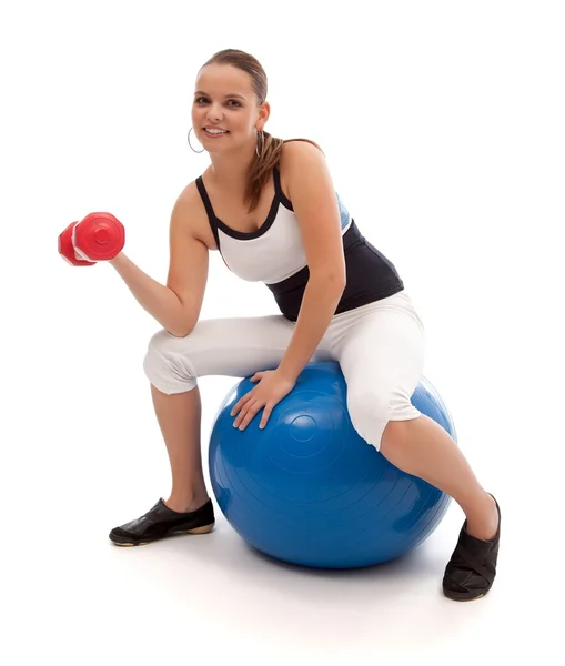 Working out on a pilates ball — Stock Photo, Image