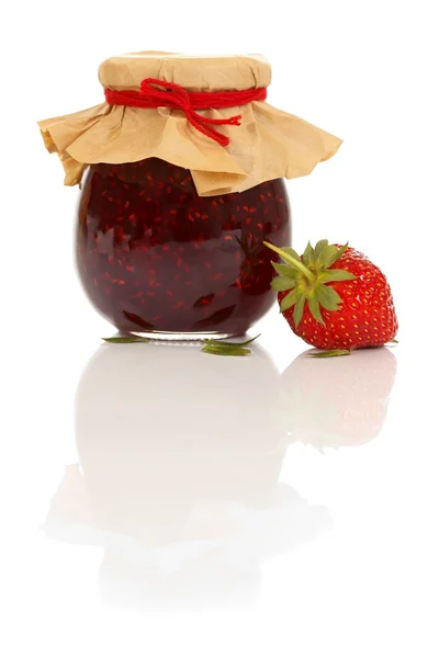 Jam pot and strawberry — Stock Photo, Image