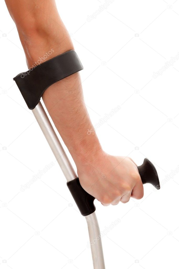 Hand holding a crutch