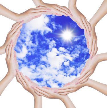 Hands forming a circle shape on blue sky clipart