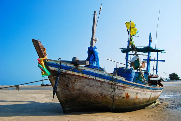 stock image Fisherman boat on the sea shore