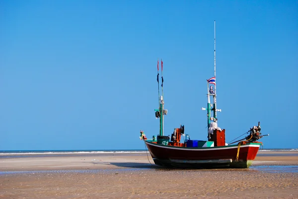 stock image Fisherman boat on the sea shore