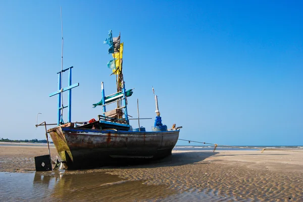 stock image Fisherman boat on the sea shore