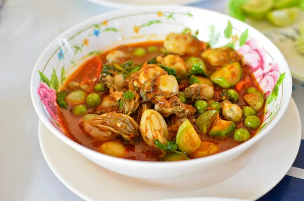 Spicy oyster soup with variety of herbs — Stock Photo, Image