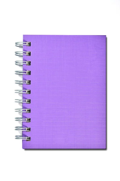 Fioletowy notebooka na białym tle — Zdjęcie stockowe
