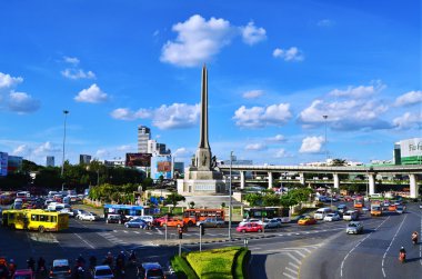 BANGKOK - AUGUST 23: Victory monument and road traffic on Augus clipart