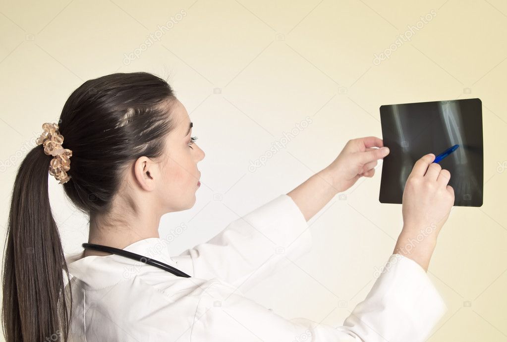 Doctor watching a patient x-ray