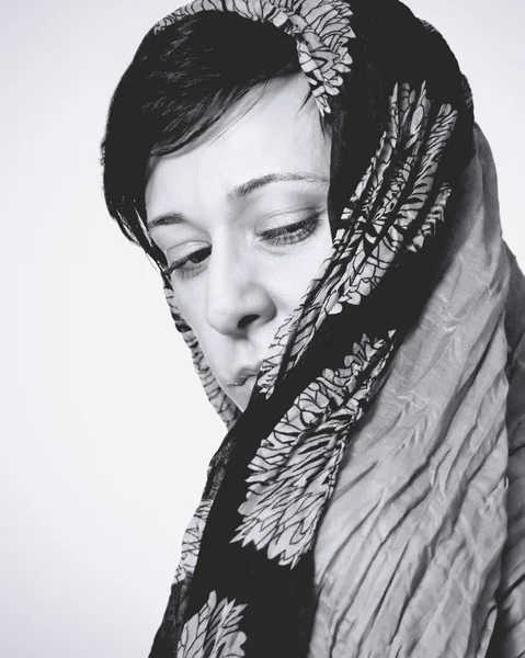 stock image Portrait of a woman with a scarf