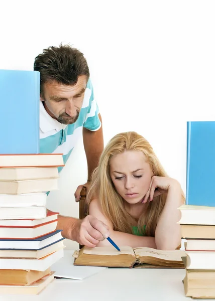 Leraar helpen tiener student één op één. — Stockfoto