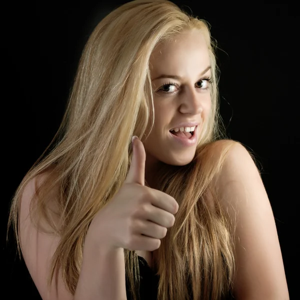 Menina mostrando polegares para cima — Fotografia de Stock