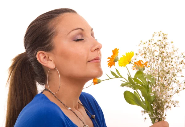 Woman with flowers Stock Picture