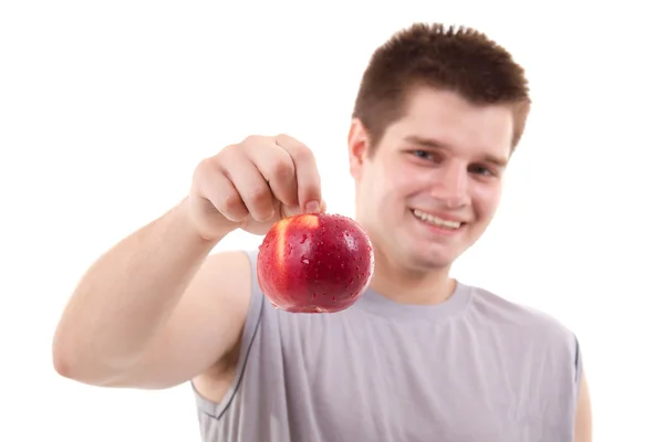 Roter Apfel in Menschenhand — Stockfoto
