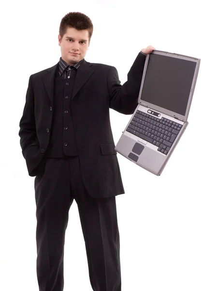 Uomo d'affari che tiene il computer portatile su bianco — Foto Stock