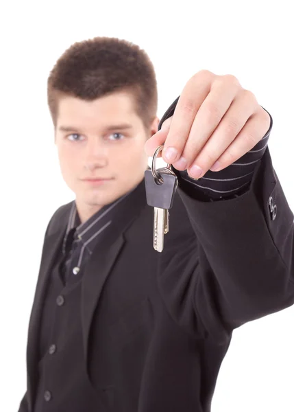 stock image Young man holding keys