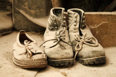 Dusty old shoes clipart