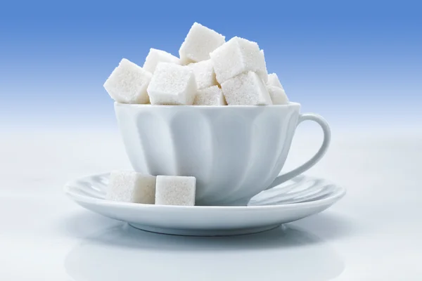 Tea cup with sugar — Stock Photo, Image