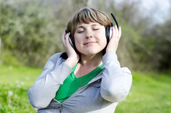 Woman and headphone — Stock Photo, Image