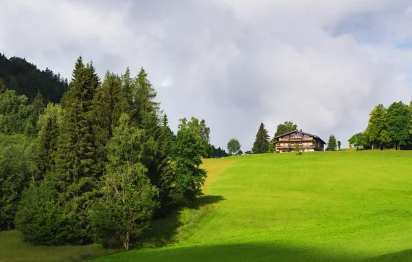 House on the top of hill — Stock Photo, Image