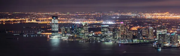 New jersey noc panorama z Nowego Jorku manhattan — Zdjęcie stockowe