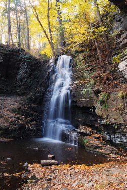 Autumn Waterfall in mountain clipart