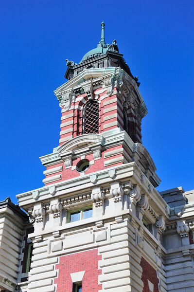 New York City Ellis Island Great Hall with blue clear sky
